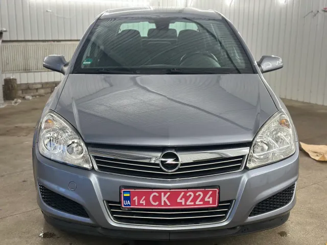 Opel Astra - фото 1