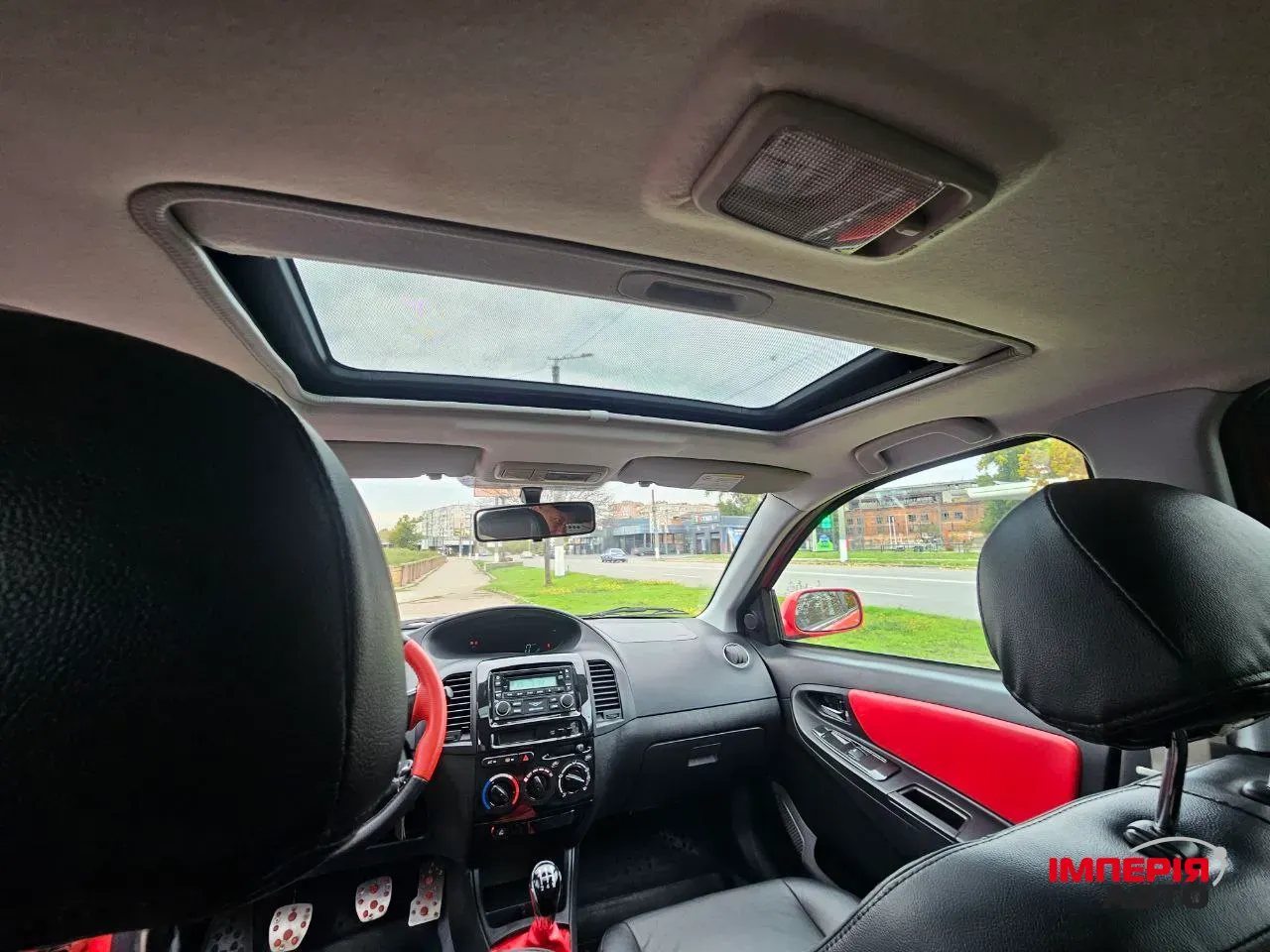 Geely MK Cross - фото 11