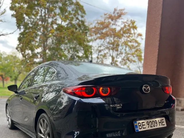 Mazda 3 - фото 5