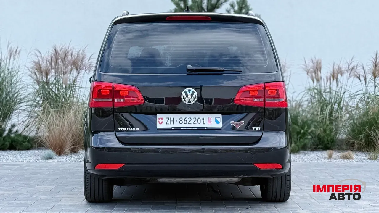 Volkswagen Touran - фото 7