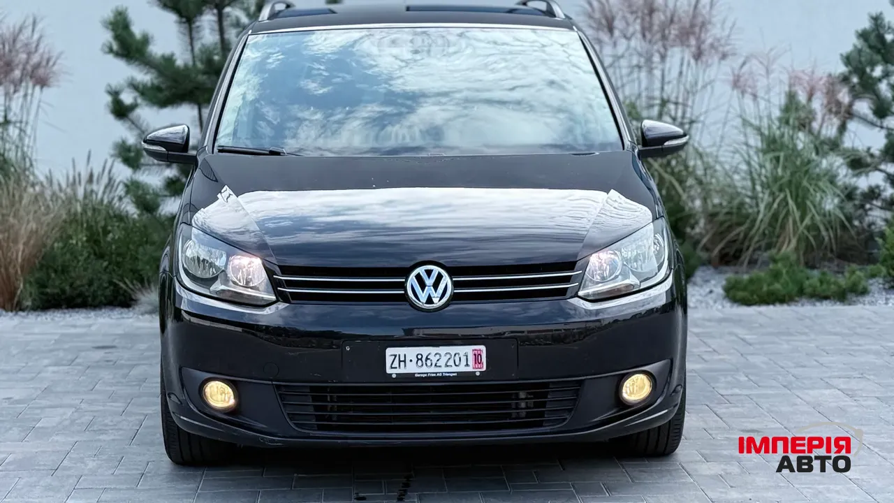Volkswagen Touran - фото 2