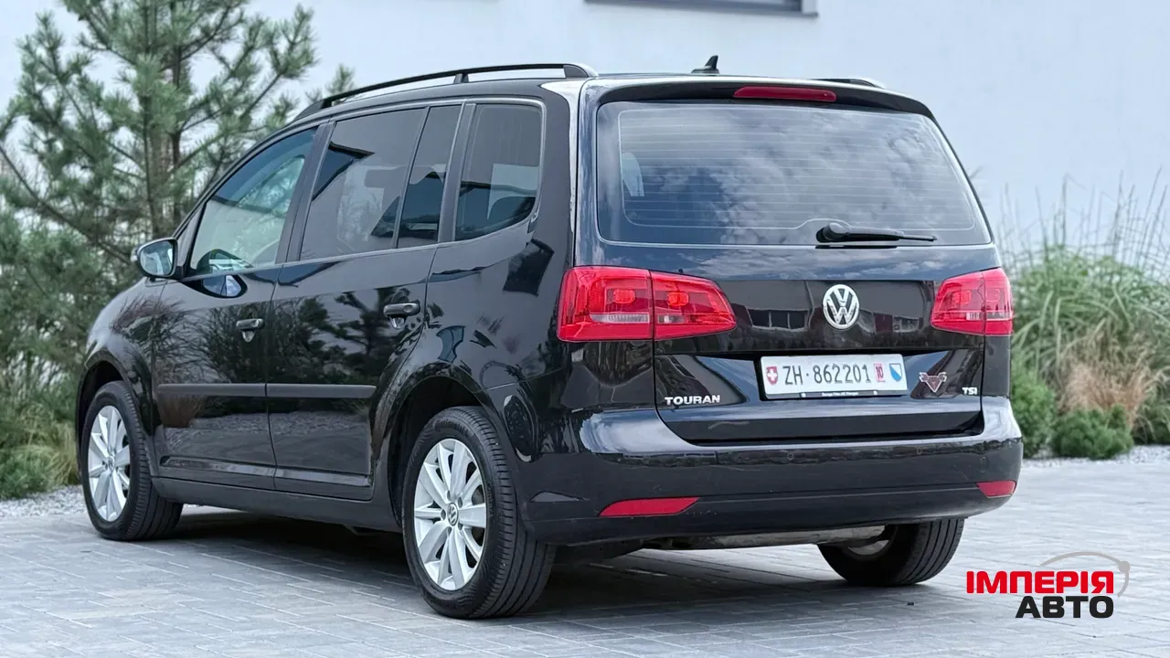 Volkswagen Touran - фото 6