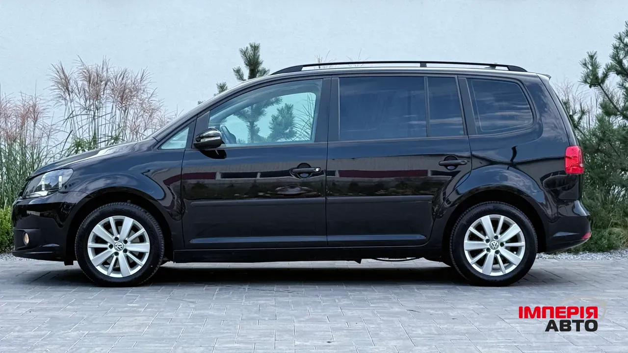 Volkswagen Touran - фото 5