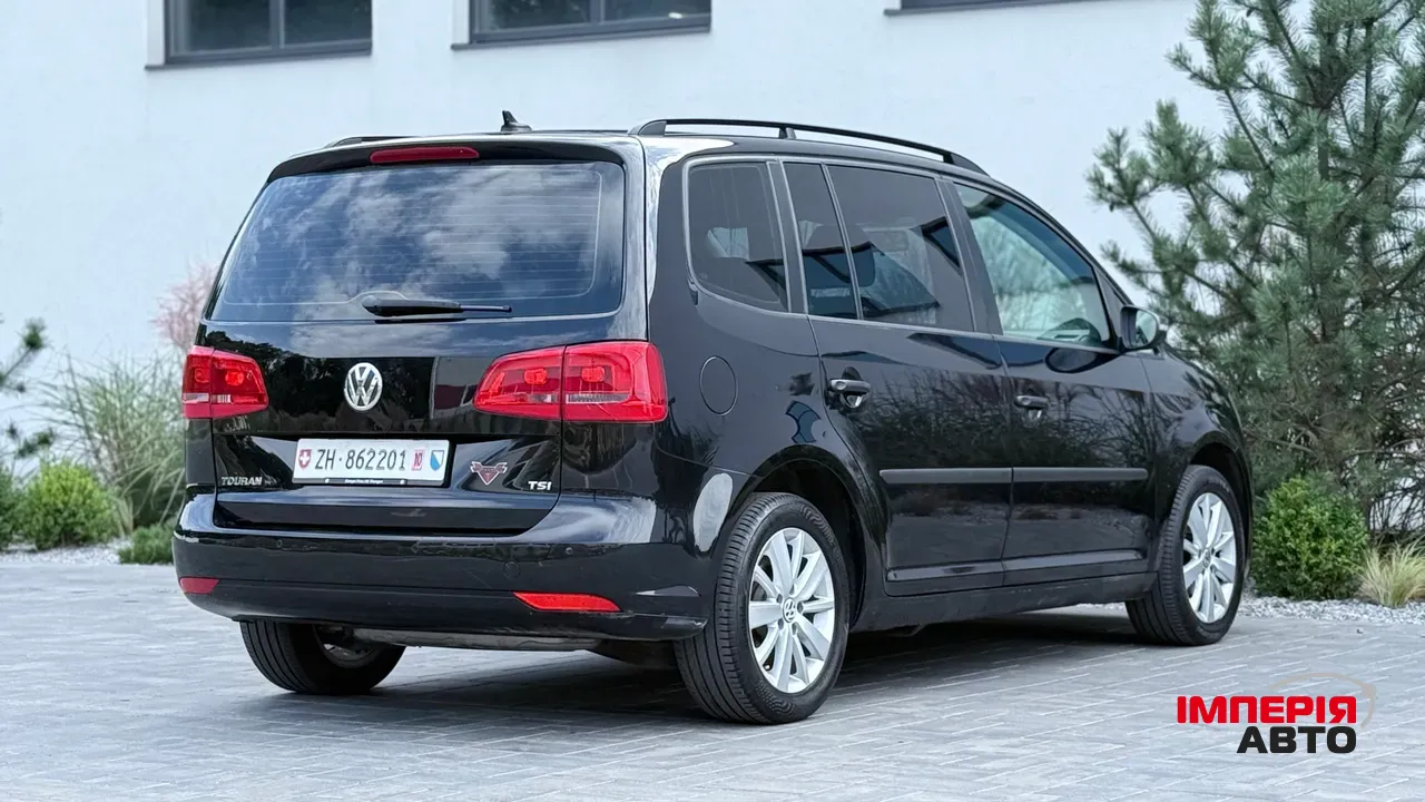 Volkswagen Touran - фото 8
