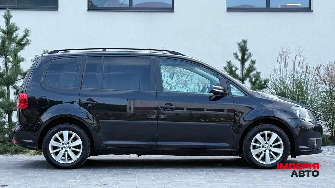 Volkswagen Touran - фото 4