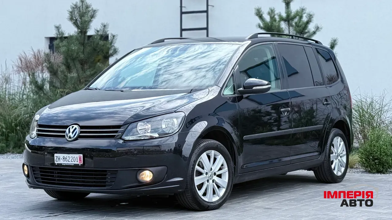 Volkswagen Touran - фото 3
