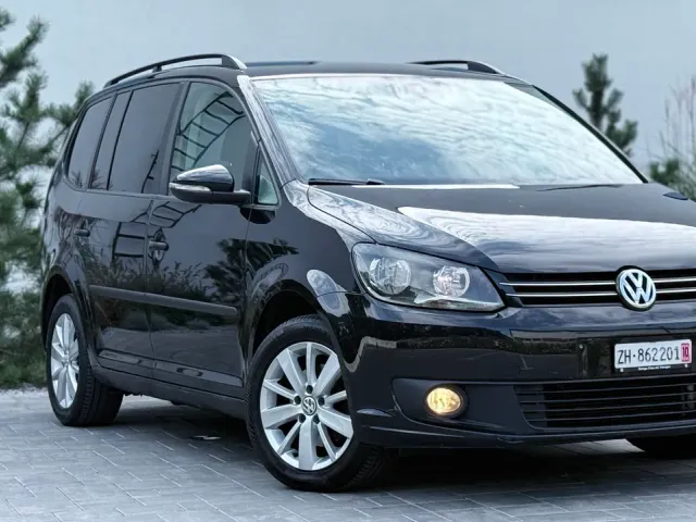 Volkswagen Touran - фото 1