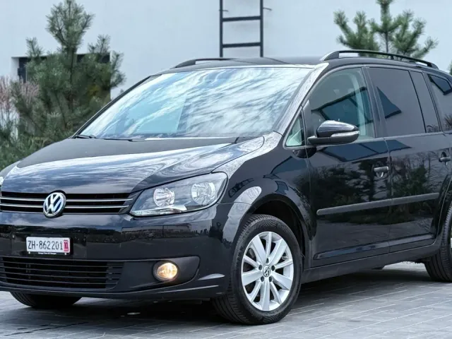 Volkswagen Touran - фото 3