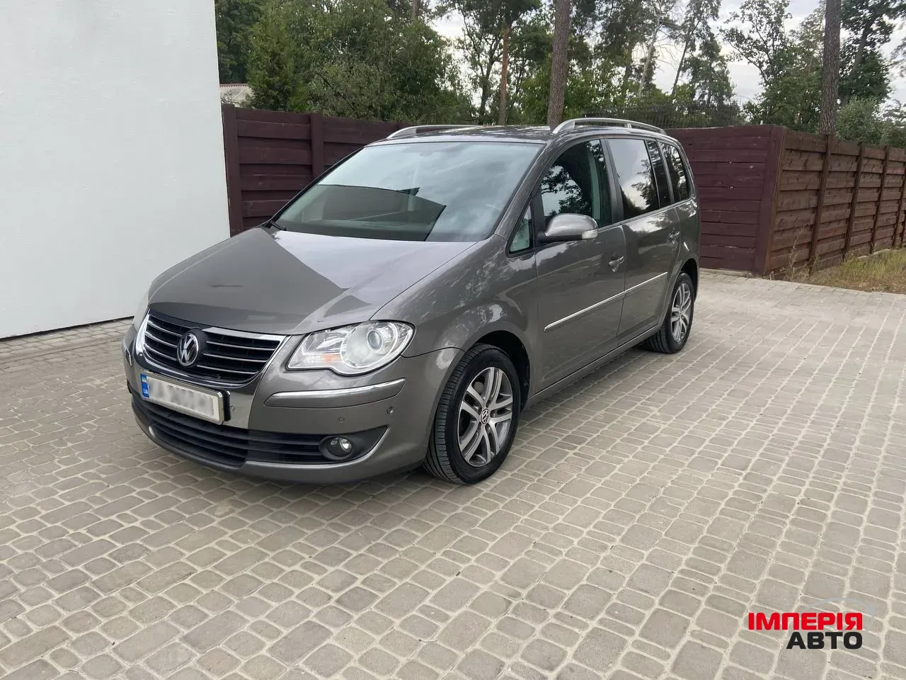 Volkswagen Touran - фото 5