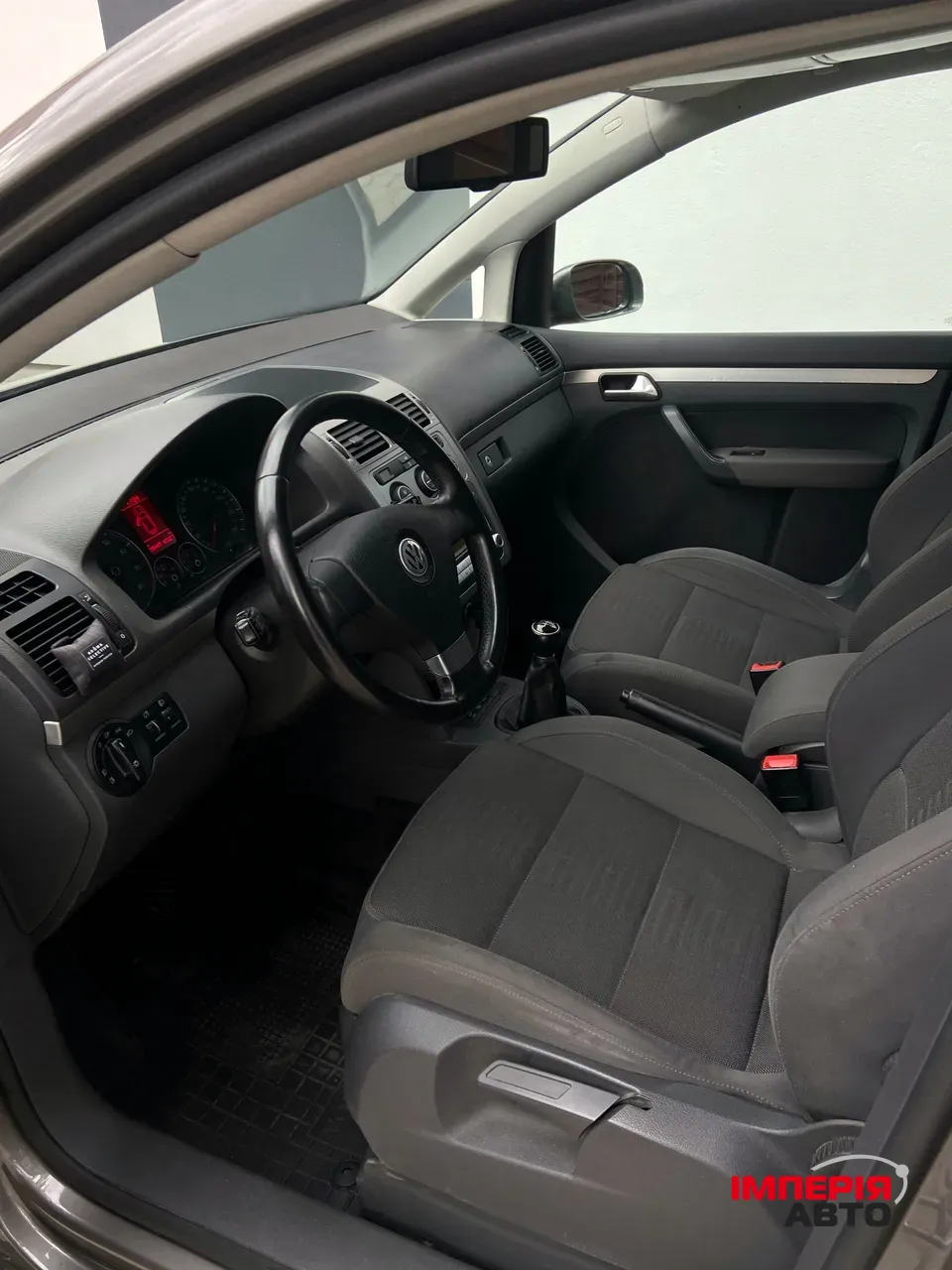 Volkswagen Touran - фото 12