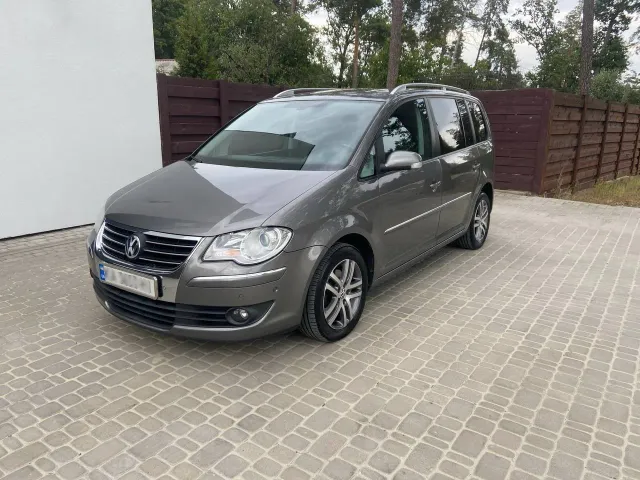 Volkswagen Touran - фото 5