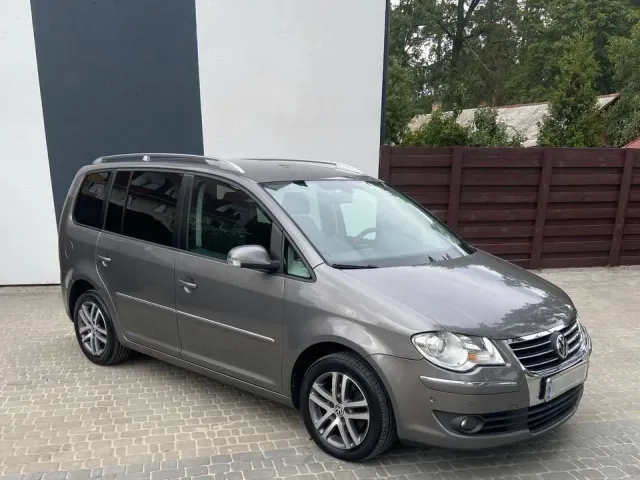 Volkswagen Touran - фото 4