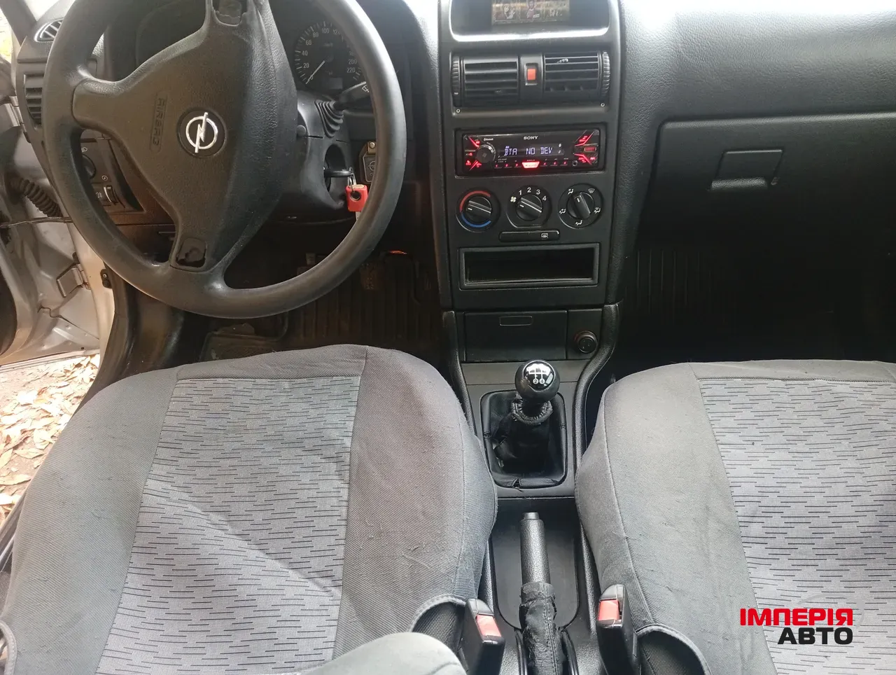 Opel Astra - фото 5