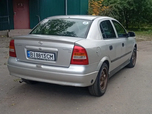 Opel Astra - фото 1
