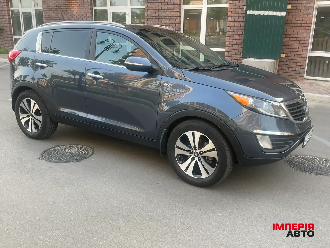 Kia Sportage - фото 7