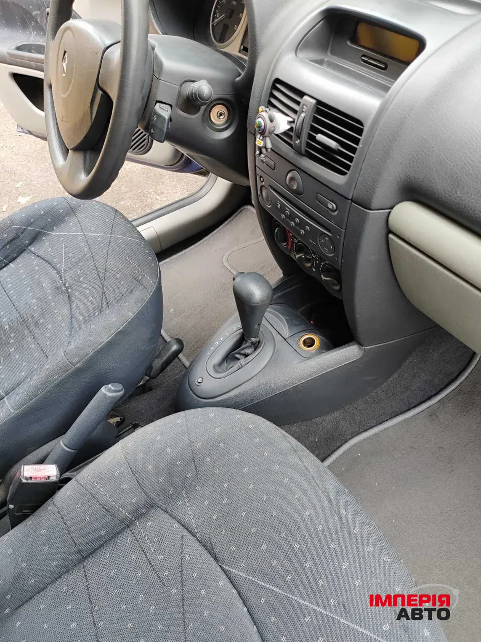 Renault Clio - фото 4