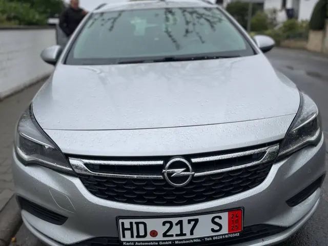 Opel Astra - фото 1