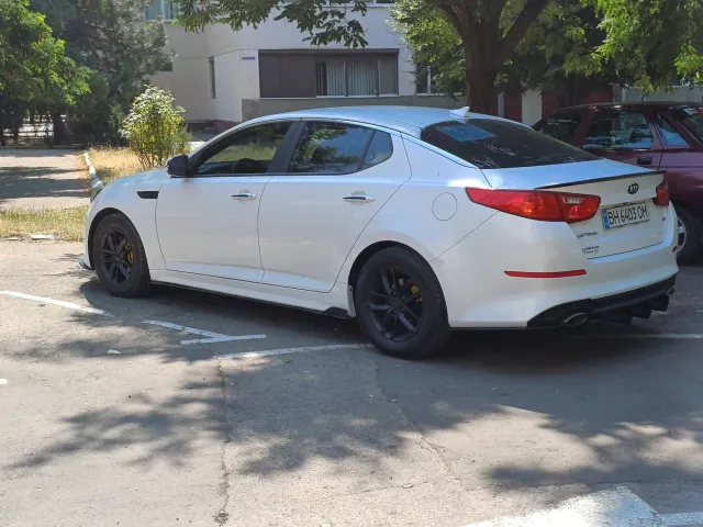 Kia Optima - фото 5