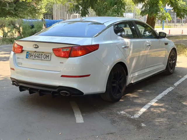 Kia Optima - фото 4