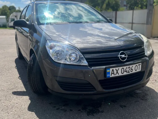 Opel Astra - фото 1