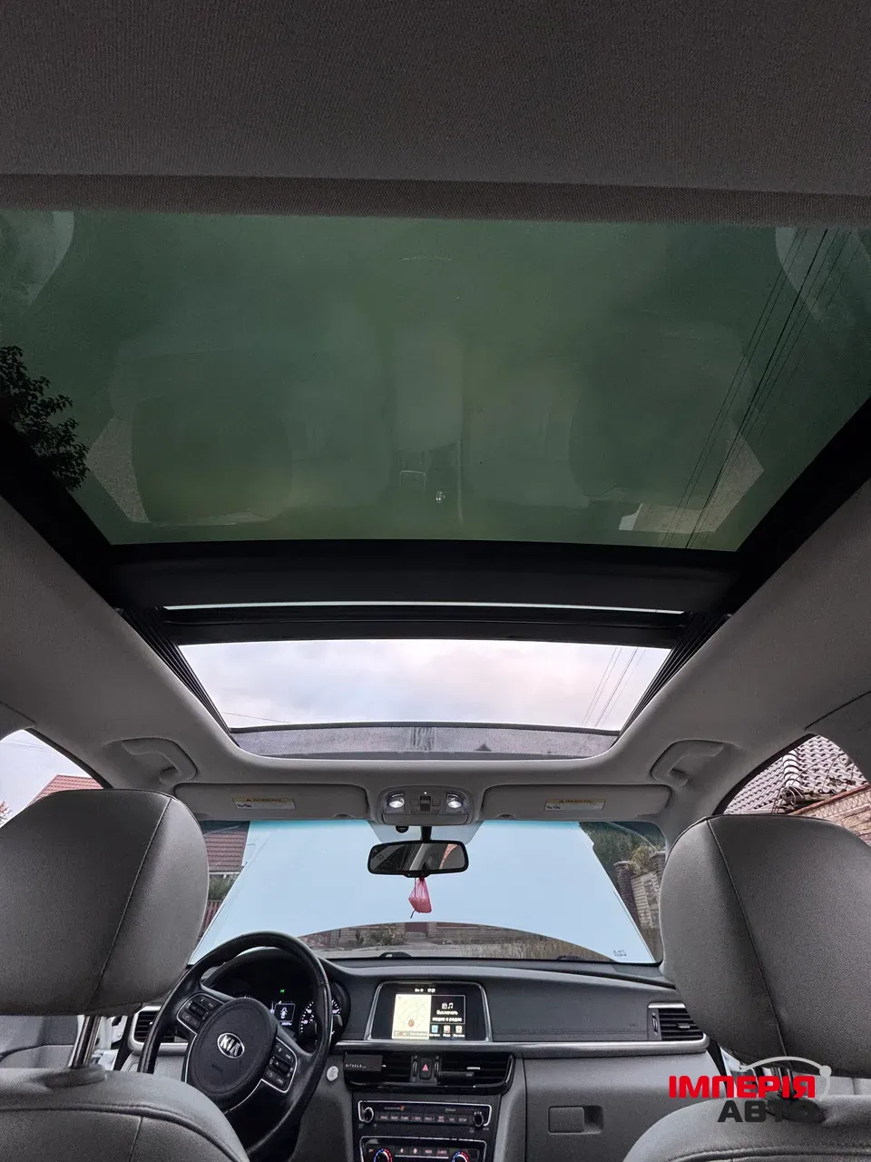 Kia Optima - фото 9