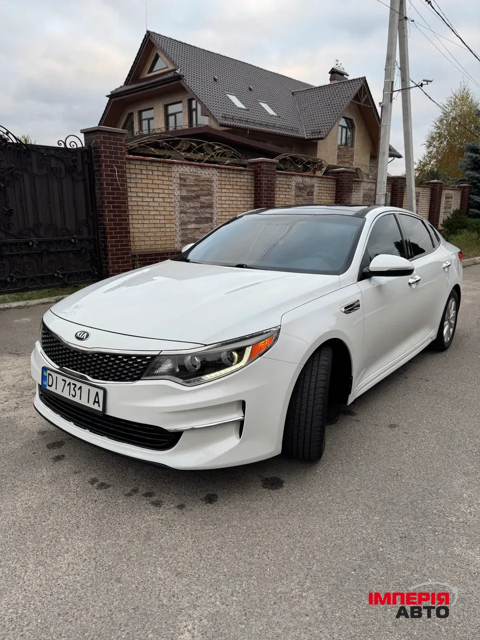 Kia Optima - фото 1