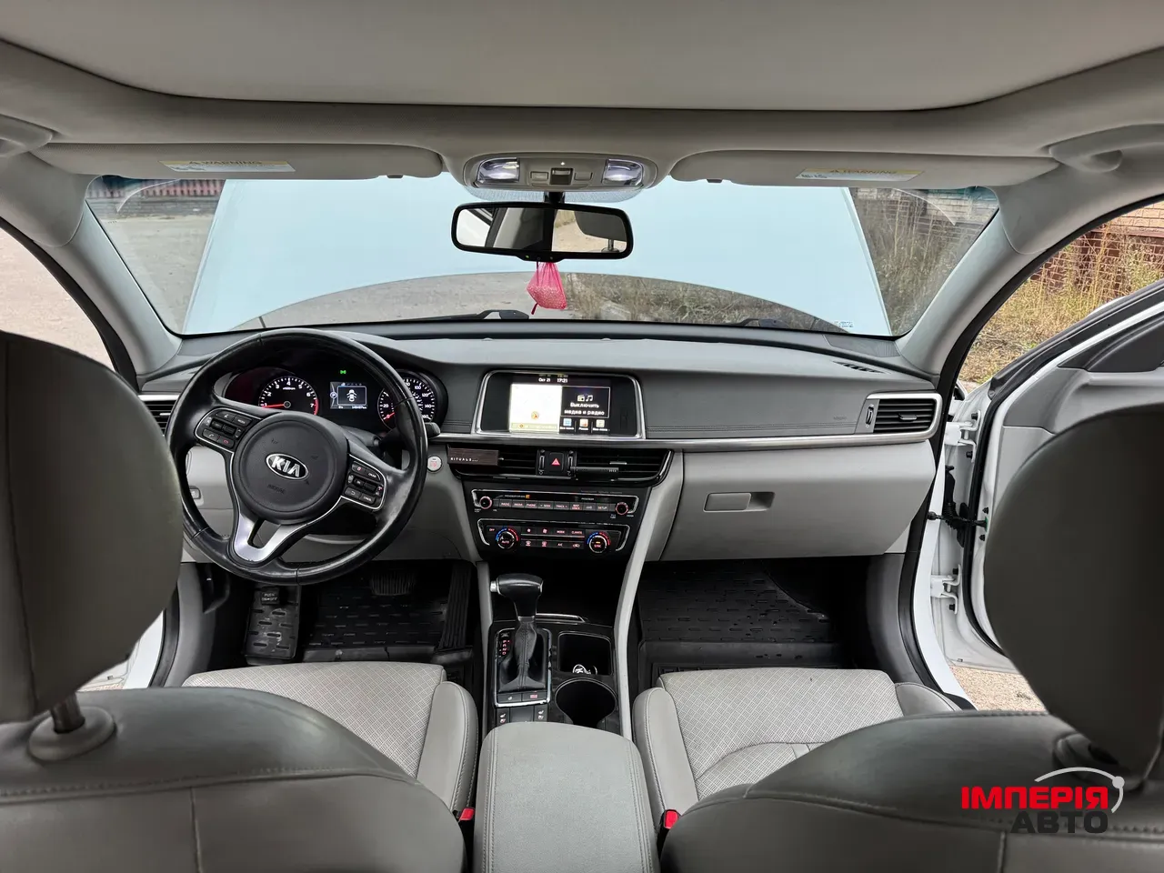 Kia Optima - фото 5