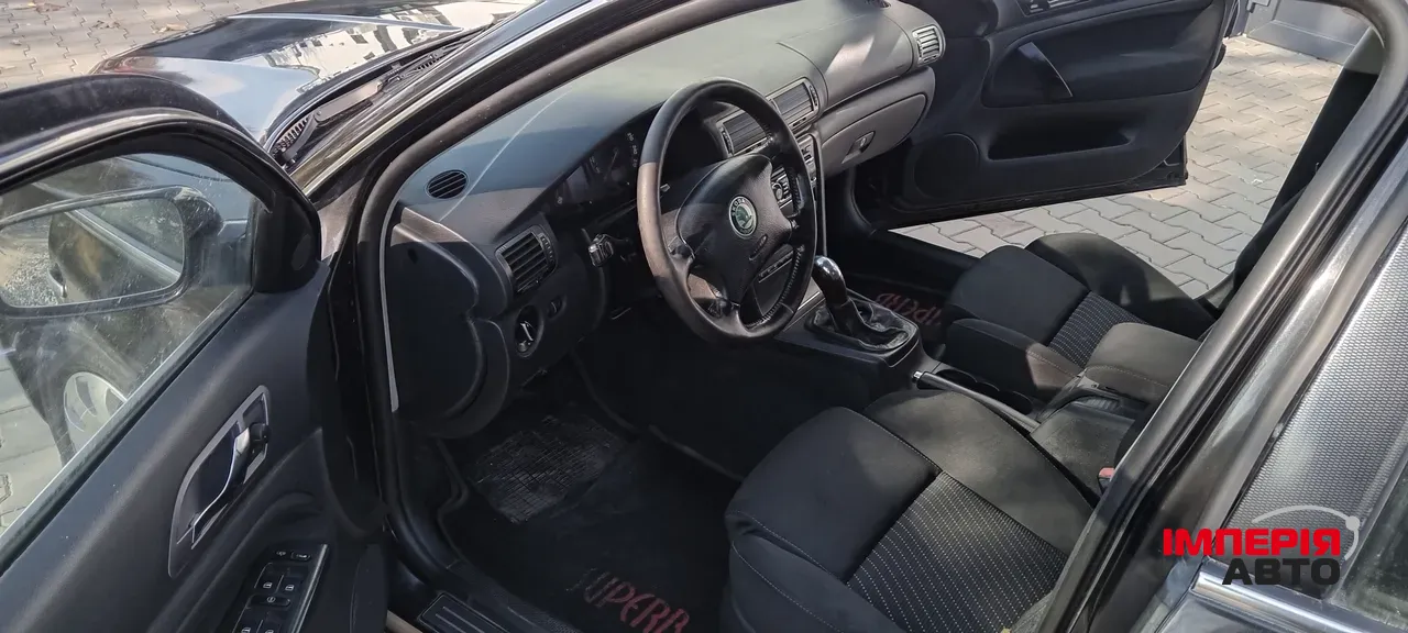 Skoda Superb - фото 12