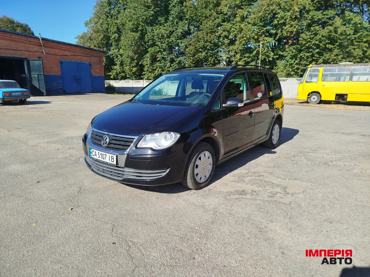 Volkswagen Touran - фото 3