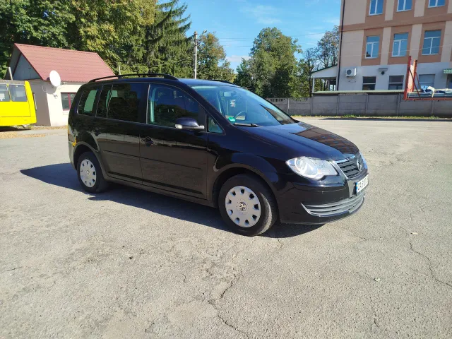 Volkswagen Touran - фото 2