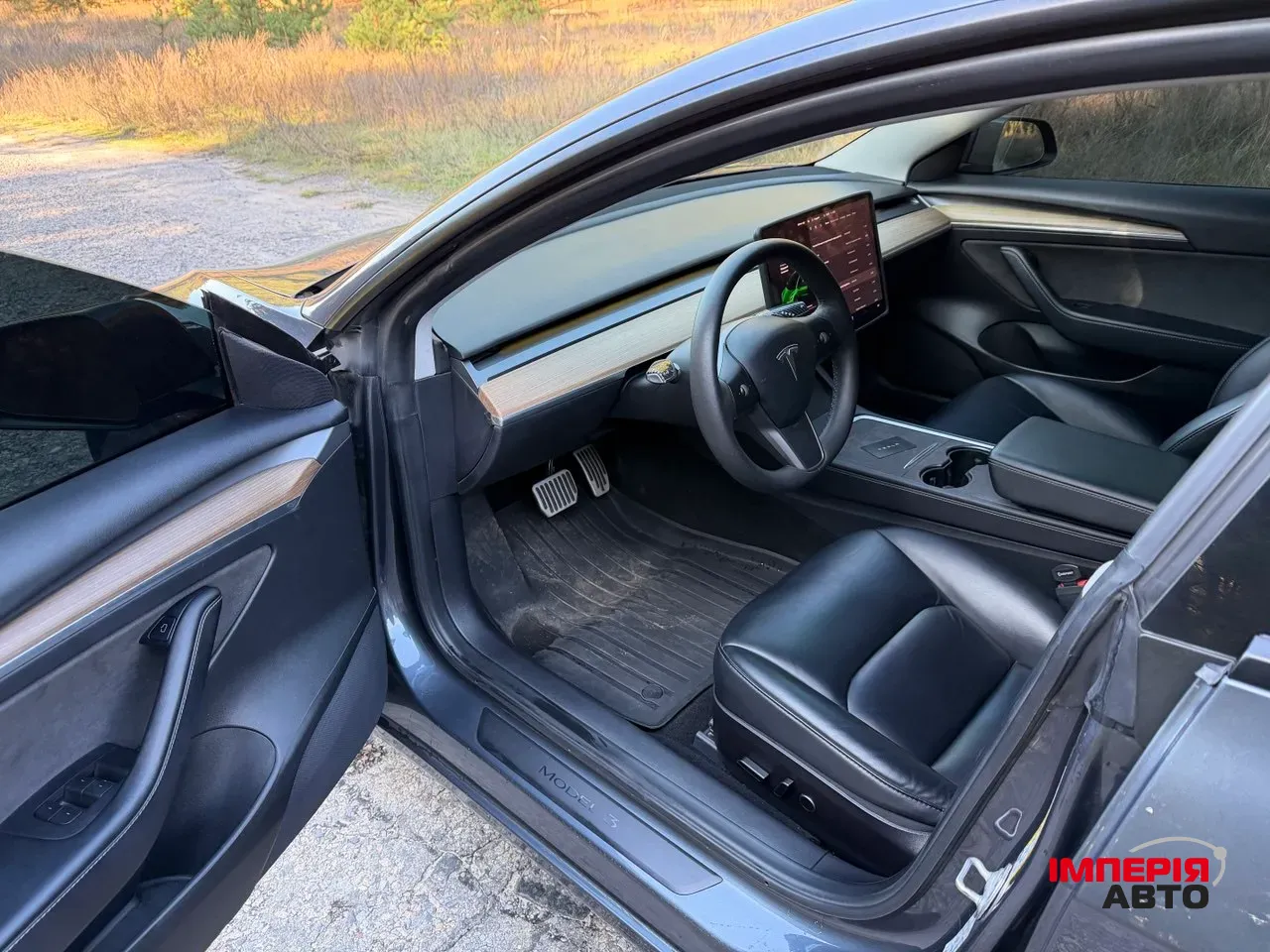 Tesla Model 3 - фото 12