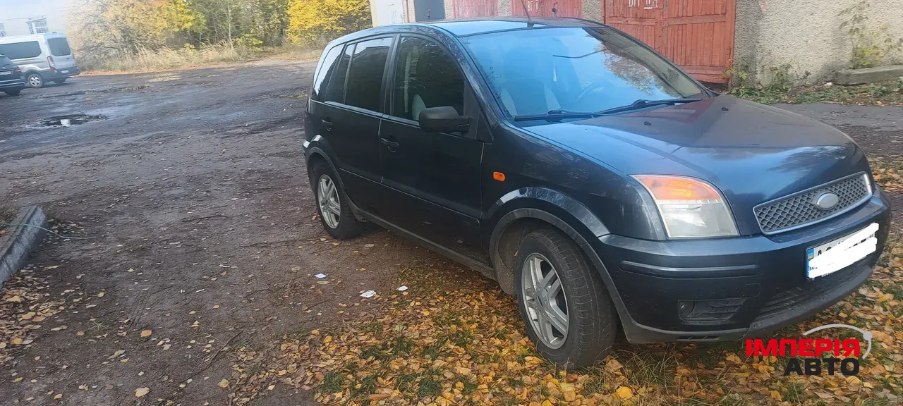 Ford Fusion - фото 1