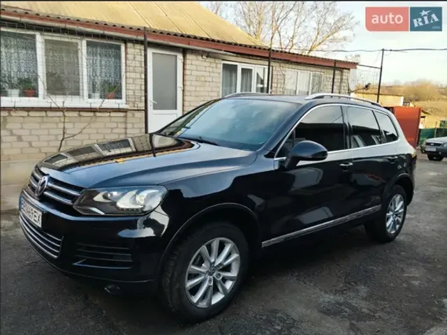 Volkswagen Touareg - фото 1