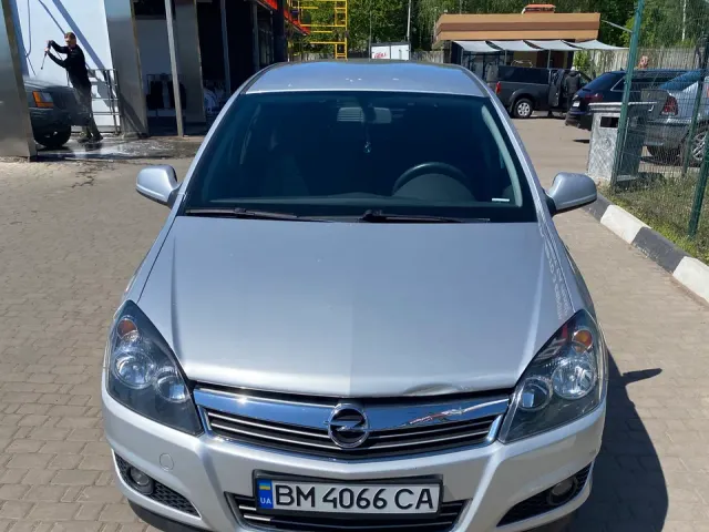 Opel Astra - фото 1