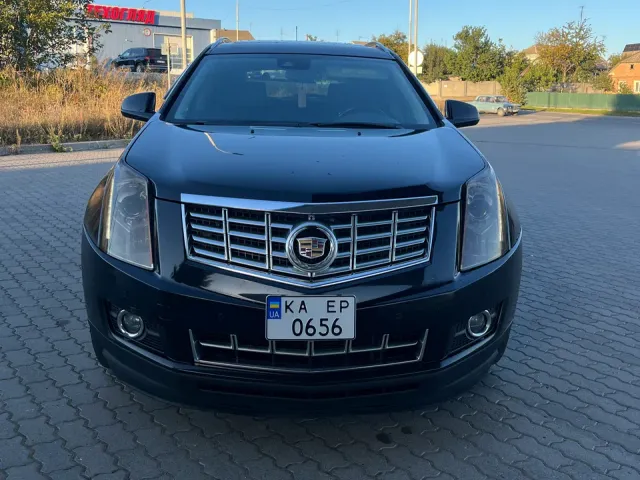 Cadillac SRX - фото 1