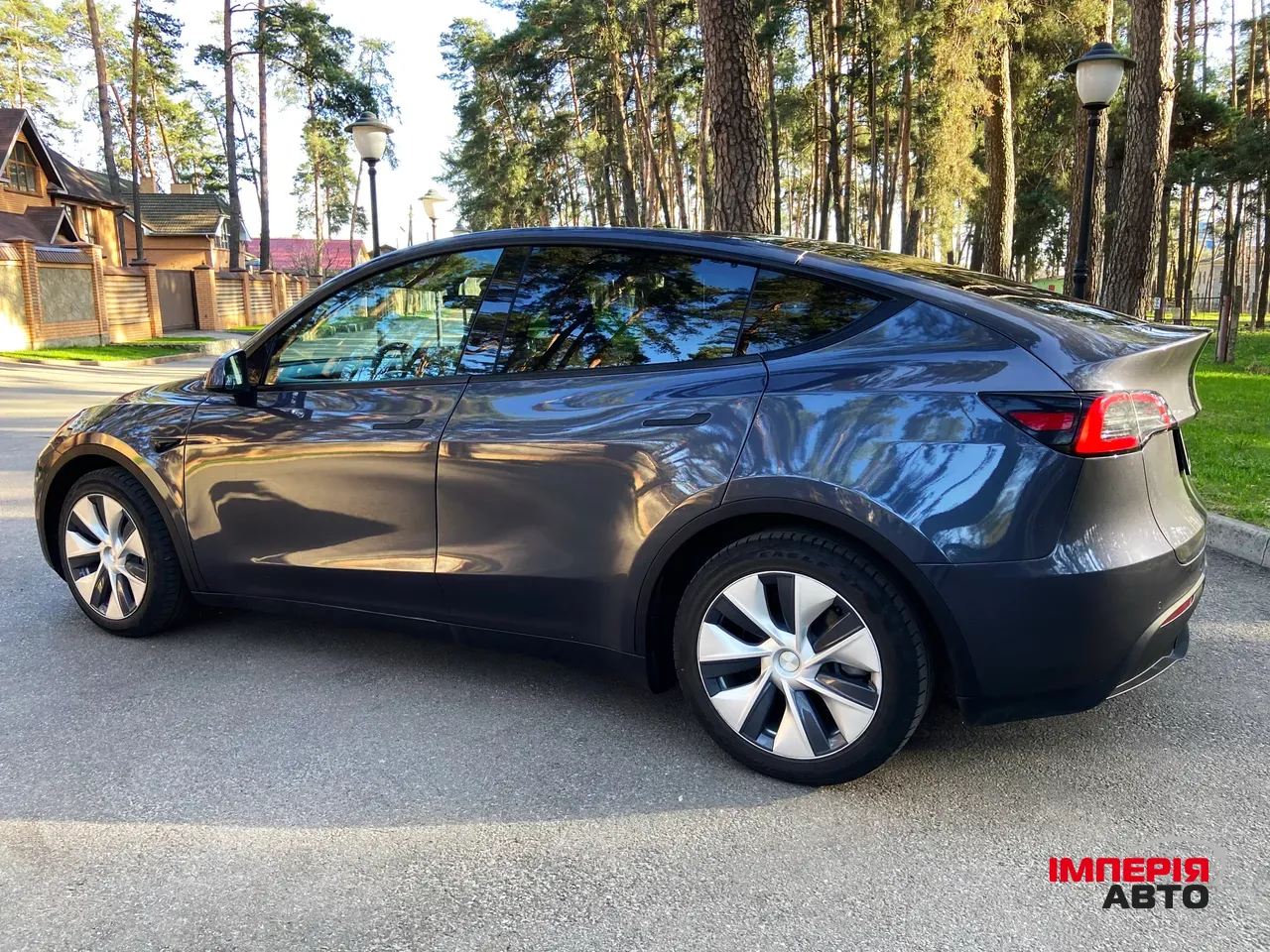 Tesla Model Y - фото 12
