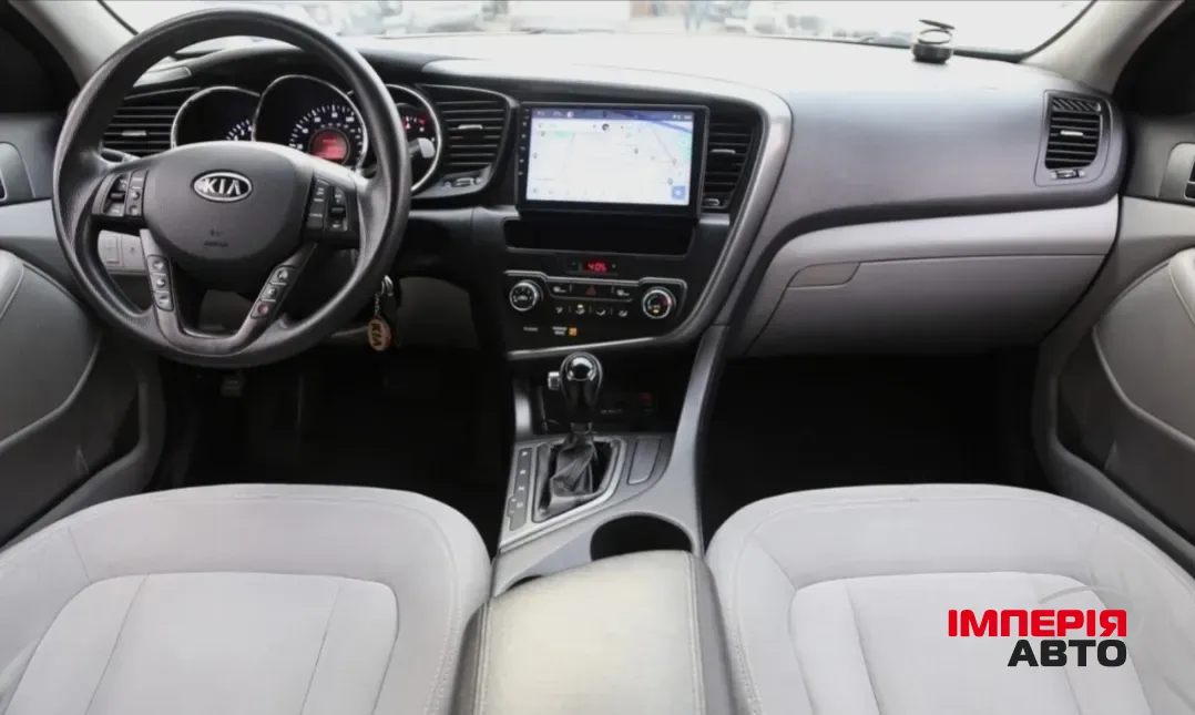 Kia Optima - фото 3