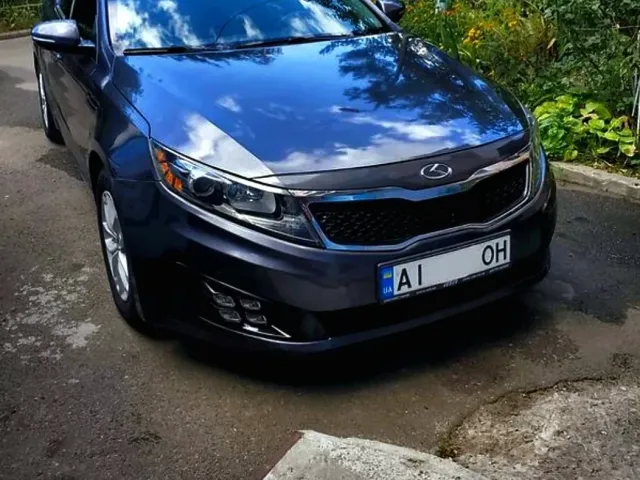 Kia Optima - фото 5