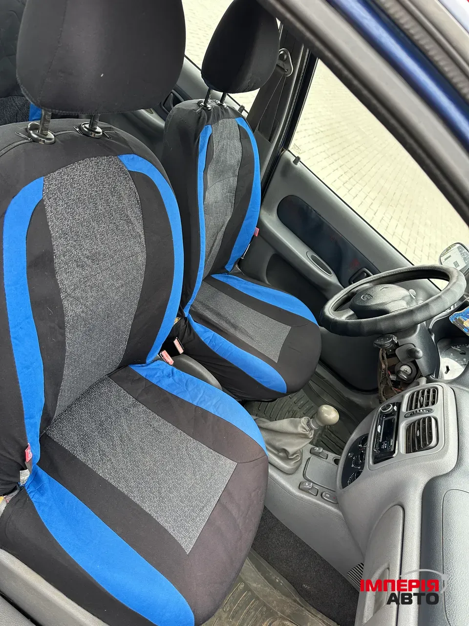 Renault Clio - фото 12