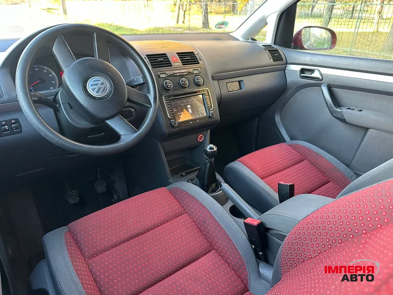 Volkswagen Touran - фото 11