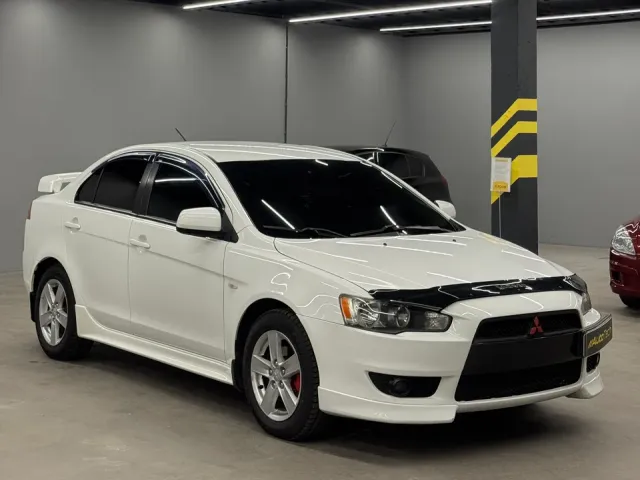 Mitsubishi Lancer - фото 1