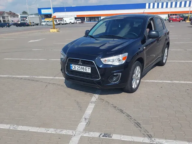 Mitsubishi Outlander Sport - фото 1