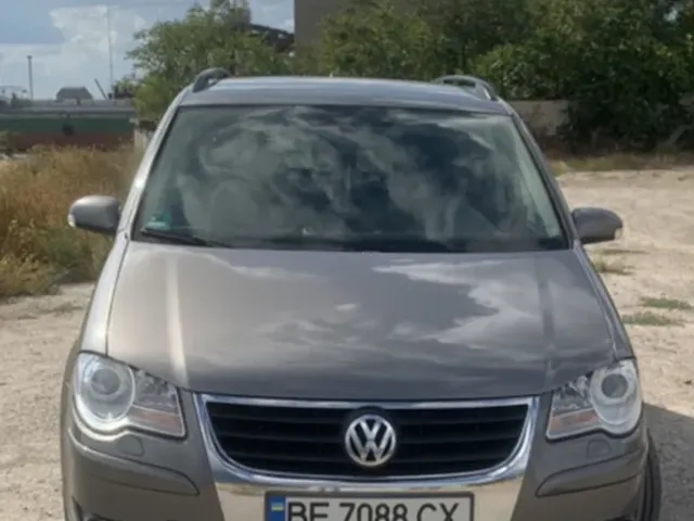 Volkswagen Touran - фото 1