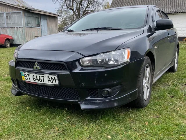 Mitsubishi Lancer - фото 1