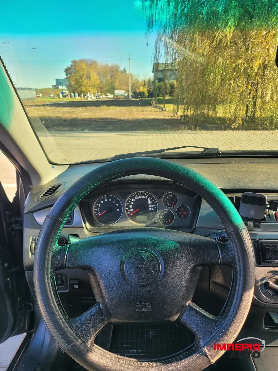 Mitsubishi Lancer - фото 7