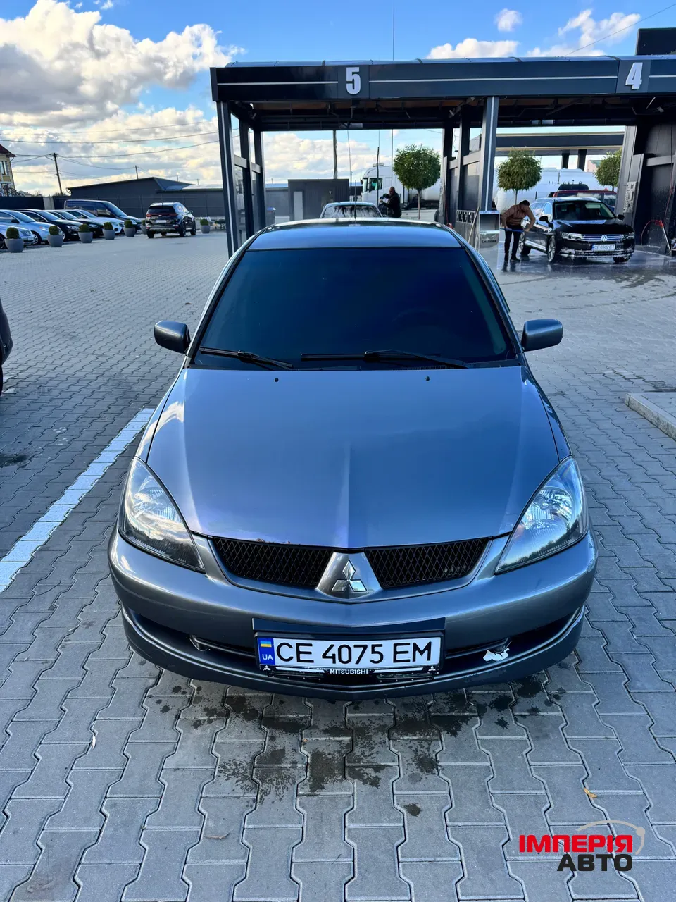 Mitsubishi Lancer - фото 1