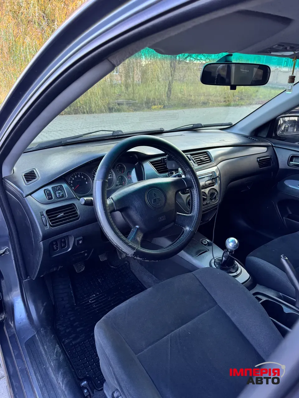 Mitsubishi Lancer - фото 4