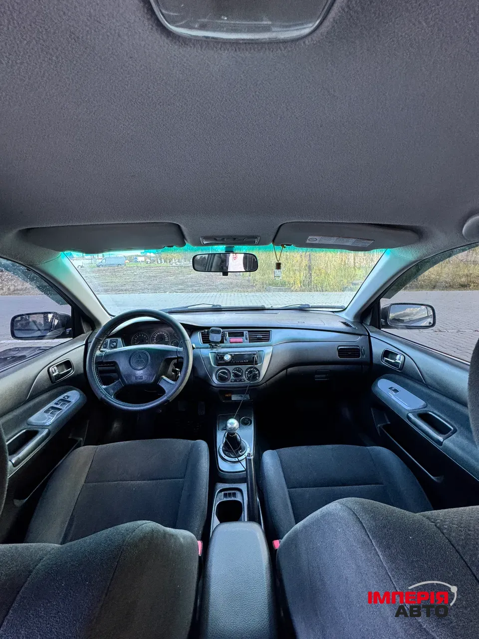 Mitsubishi Lancer - фото 6