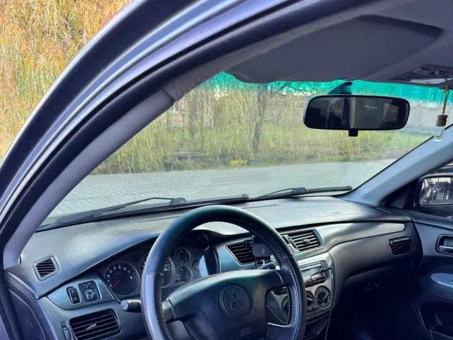 Mitsubishi Lancer - фото 4