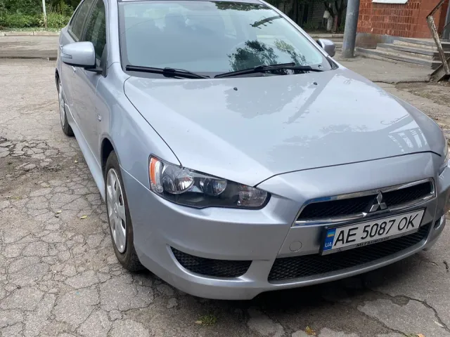 Mitsubishi Lancer - фото 1